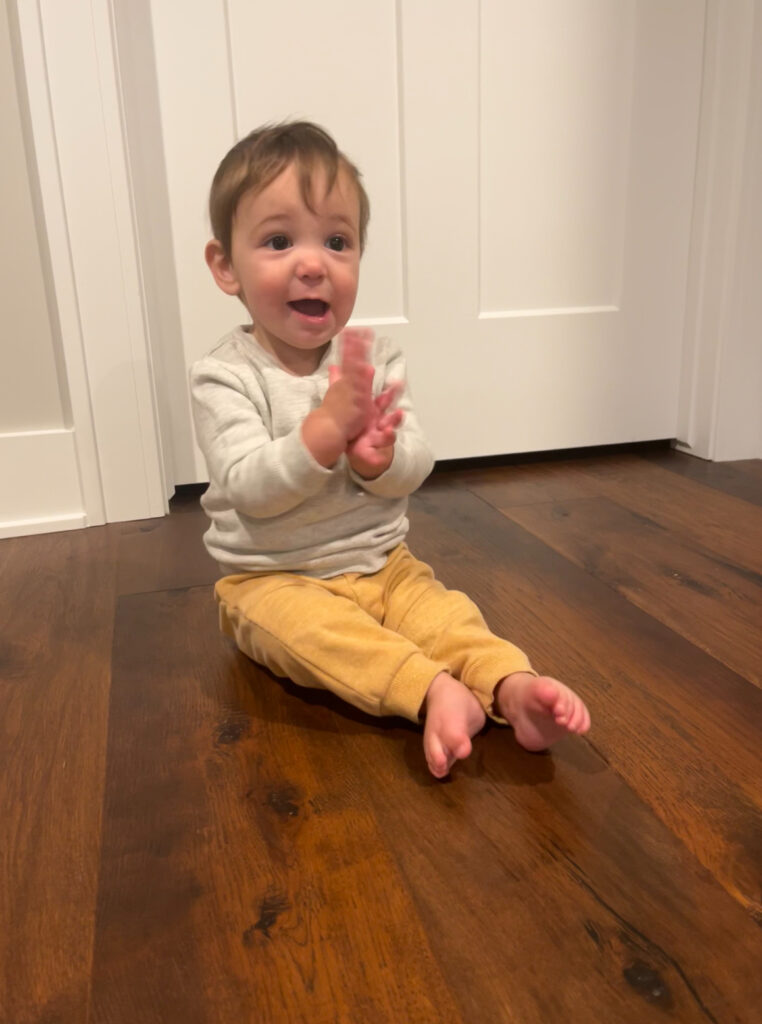 clapping 9-month-old